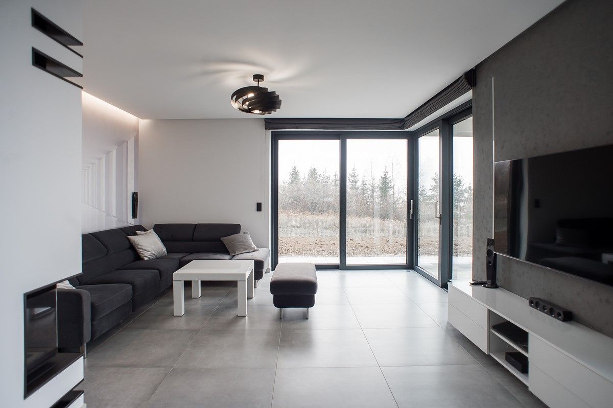 Wohnzimmer mit Zugang zur Terrasse